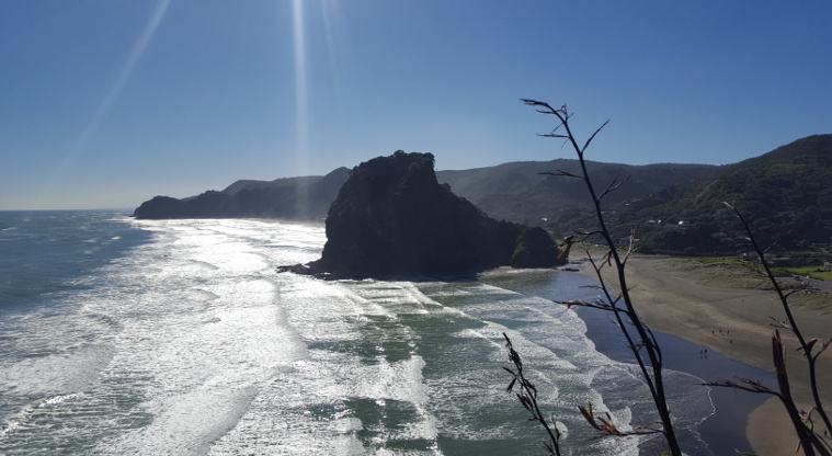 Feel the black sand at Piha beach