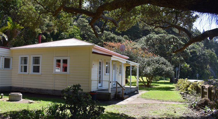 Barr Cottage — External view with the surrounding garden.