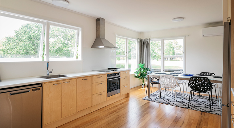 Kaipātiki Bach - Kitchen and dining area.