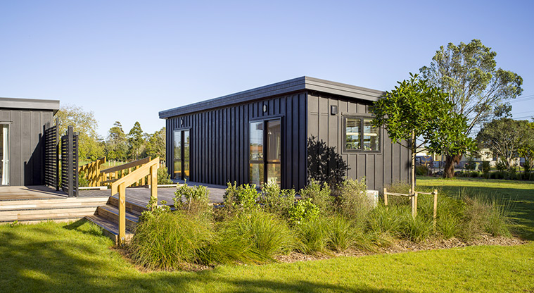 Te Tino tiny home - Steps leading up to the deck from the garden area at the back.