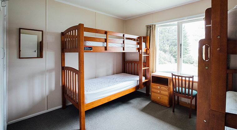 Baileys Cottage - Bedroom with two sets of single bunks.
