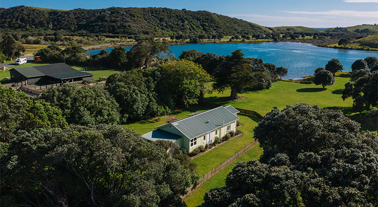 Tāwharanui Bach - Aerial view of the bach and surrounding area.