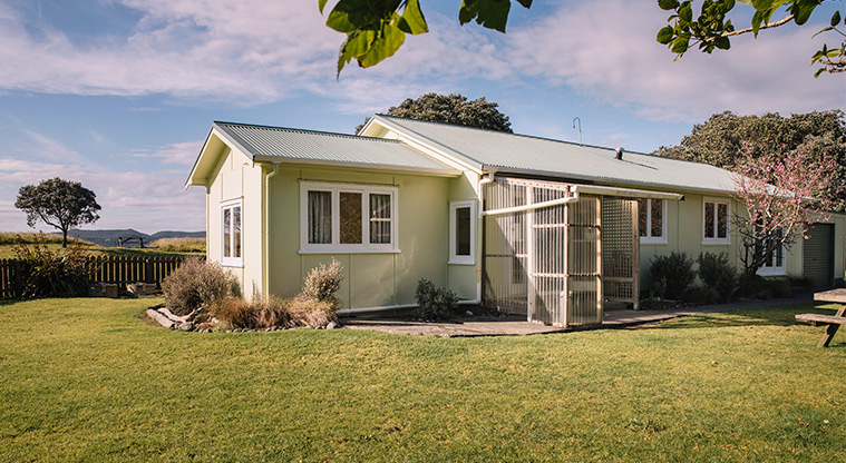 Tāwharanui Bach - External view of the back on the bach.