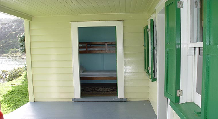 Puhoi Cottage - Bunk room and verandah access.
