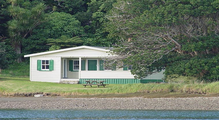 Puhoi Cottage - View of the cottage from across the Puhoi River.