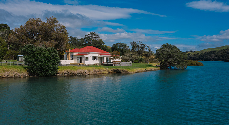 Schischka House - View of the house from the other side of the Puhoi Estuary.