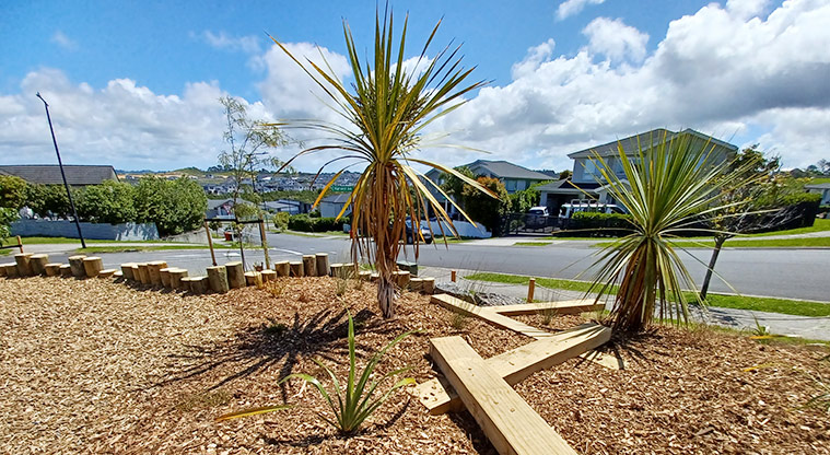 86 Harvest Avenue - A series of planks and stumps for balancing and walking across through the bark garden.