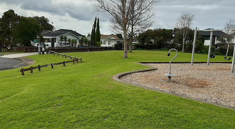 Alan Reserve - Open space and a rocker toy in the playground. Photo credit: T Hodder.