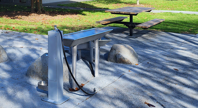 Aorere Park - The water play area with a picnic table in the background.