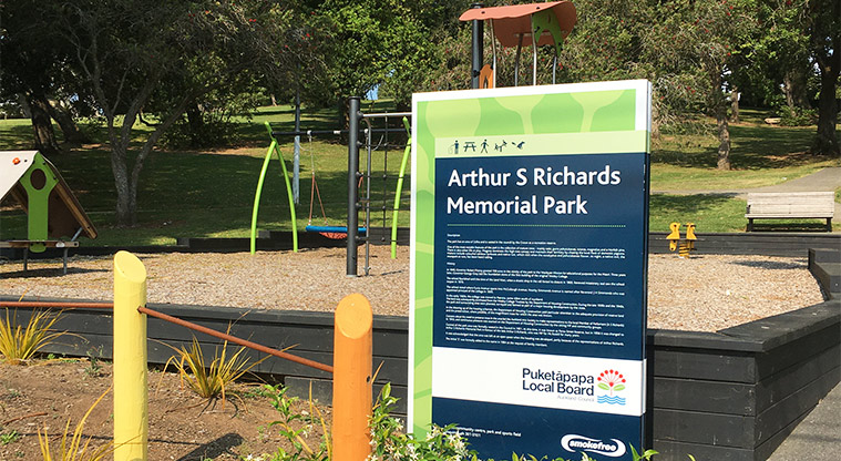 Arthur S Richards Memorial Park - Park sign with playground for preschool children in the background. Photo credit: S Hulse.
