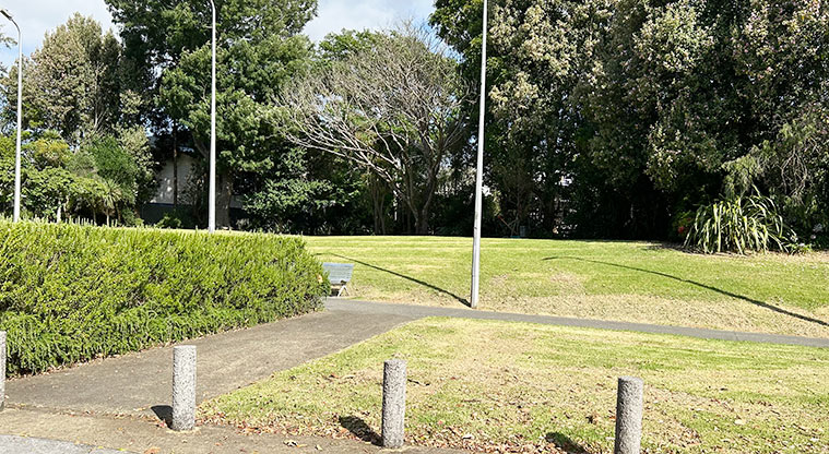 Ballantyne Square - A series of bollards with grassed space and trees in the background. Photo credit: S Hulse.