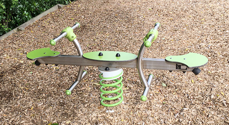 Bannerman Reserve - Bright green bouncy seesaw. Photo credit: S Hulse.