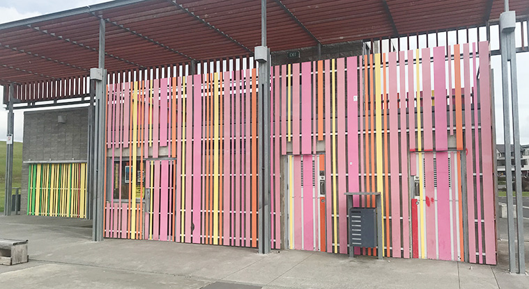 Barry Curtis Park - One of the toilet blocks with colourful wood panels.