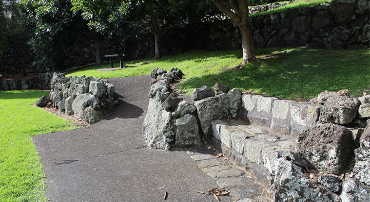 Bellevue Reserve - Footpath and stone walls with a built-in seat.