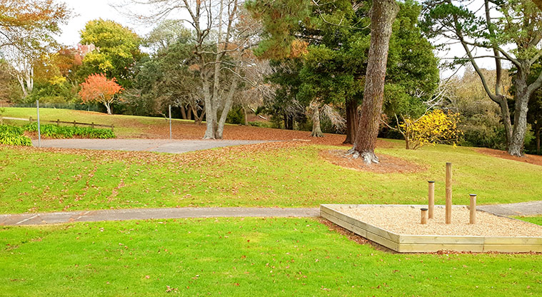 Blockhouse Bay Recreation Reserve - Balance poles and the volleyball court in the background.