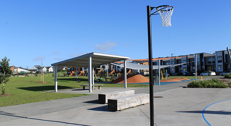 Bonair Crescent Stormwater Pond - Basketball hoop with a shaded picnic table and junior play area in the background. Photo credit: M Loubser.