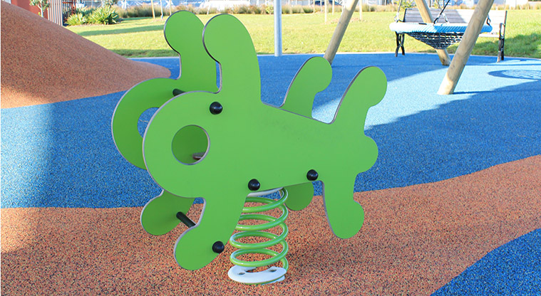 Bonair Crescent Stormwater Pond - Bright green rocker toy. Photo credit: M Loubser.
