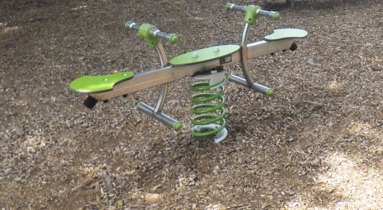 Braemar Reserve - Bright green bouncy seesaw for the smaller children. Photo credit: J Grigg.