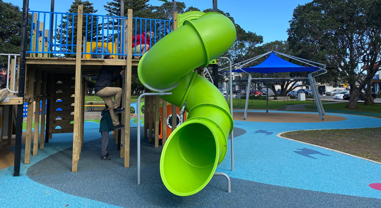 Browns Bay Beach Reserve - A bright green spiral slide. Photo credit: T Hodder.