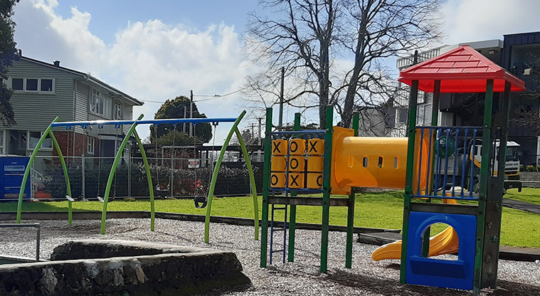 Puāwai / Cadness Reserve - Set of four swings and a small fort with a slide, tunnel and ladder. Photo credit: S Hulse.