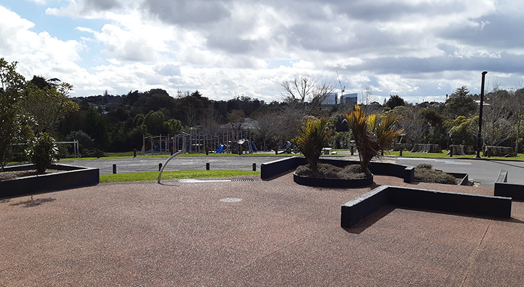 Ōkaurirahi / Ceramco Park – Looking down from the steps in front of the Glen Eden Athletics and Harrier Club to the playground.