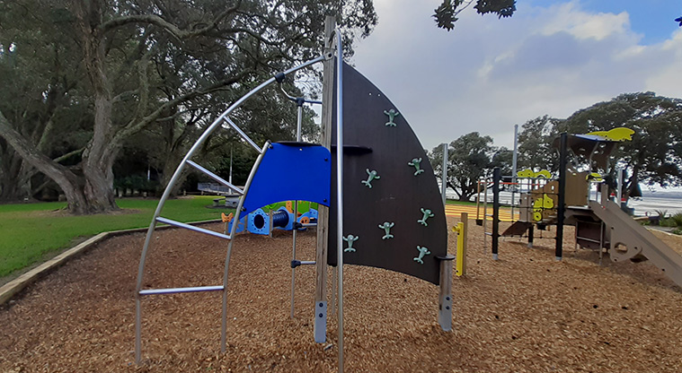 Cockle Bay Reserve - Standalone climbing frame with wall and bars.