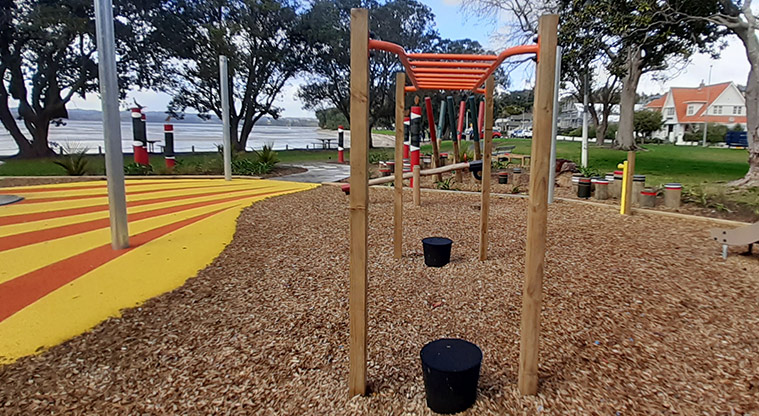 Cockle Bay Reserve - Set of bright red monkey bars for swinging.