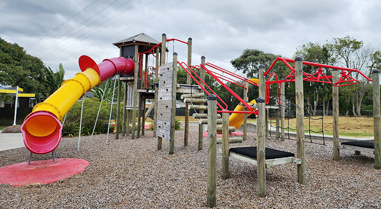 Toetoe-roa / Cooper Park - Play module with climbing and hanging equipment, wobbly log steps, ramps and slides.