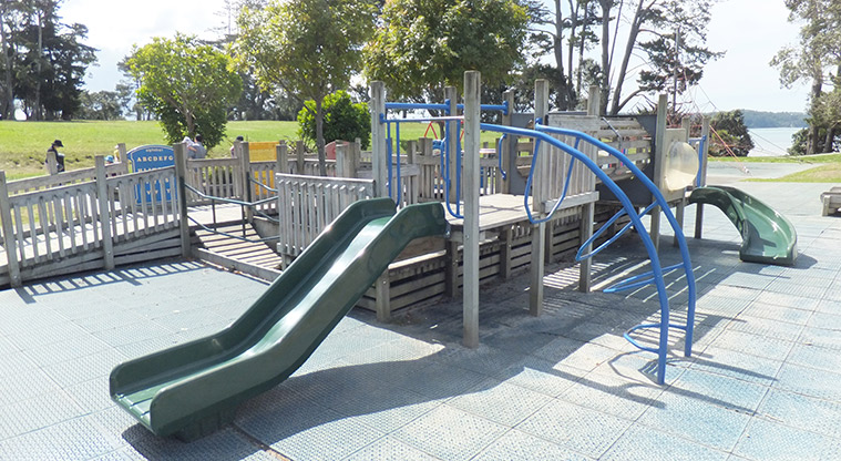 Coyle Park - Wooden fort type playground with ramps, slides, climbing bars, and more. Photo credit: J Grigg.