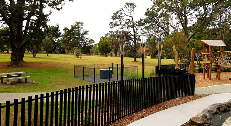 Craigavon Park - Playground with the barbecue and open space in the background.