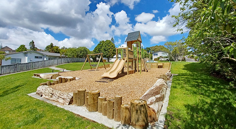 Cranston Street Reserve - The playground with a range of logs and posts around to edge for balancing and jumping across.