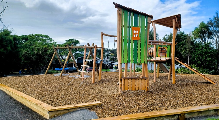 Dalmatia Green - Playground with ramp access into the play area, climbing ramps, wobbly bridge, play towers, swings and a slide.