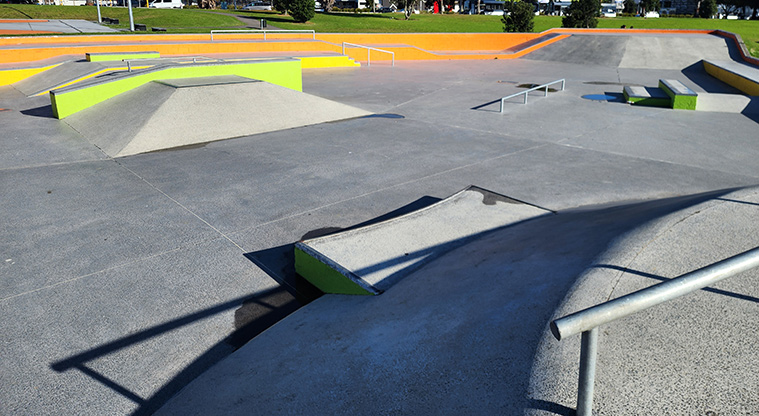 David Lange Park - A section of the skate park showing ramps, poles, steps and more.