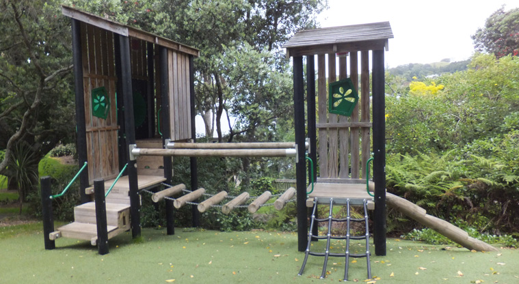 Edenvale Park - Two covered wooden towers with climbing net, wobbly bridge, balance log and steps. Photo credit: J Grigg.