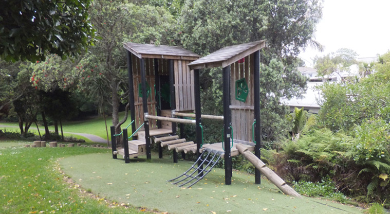 Edenvale Park - Two covered wooden towers with climbing net, wobbly bridge, balance log and steps. Photo credit: J Grigg.