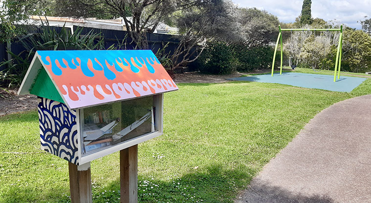 Francis Reserve - Little community book library, with the swings in the background. Photo credit: T Hodder.
