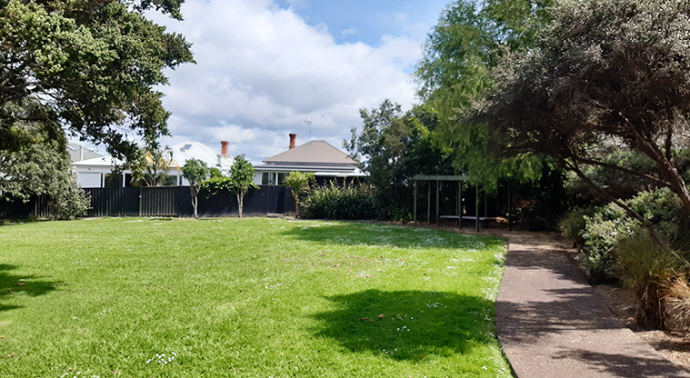 Francis Reserve - Open grassed area with trees, and a path down the right hand side. Photo credit: T Hodder.