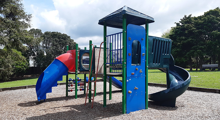 Francis Reserve - Two brightly coloured play modules with steps, ladders, climbing equipment, slides, and more. Photo credit: T Hodder.