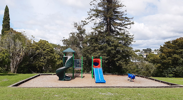 Francis Reserve - Two brightly coloured play modules with steps, ladders, climbing equipment, slides, and whale rocker toy. Photo credit: T Hodder.