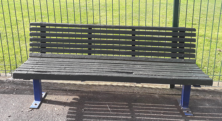 Kohuora Park - Seat inside the playground fence.