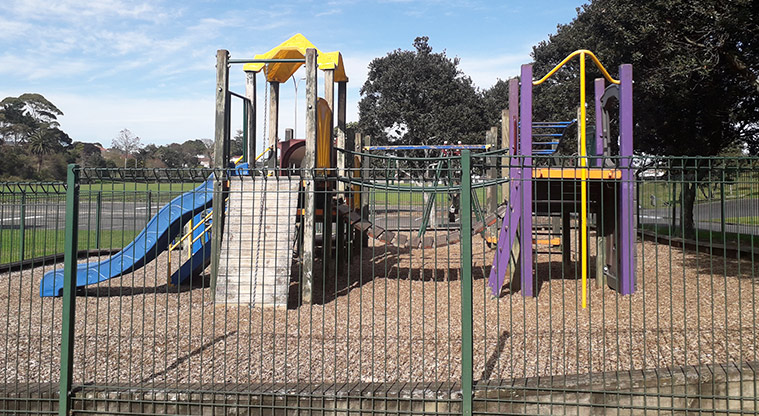 Kohuora Park - Looking at the playground through the fence.
