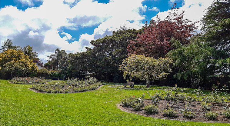 Gribblehirst Park - Garden with flower beds, seating, grassed areas and mature trees.