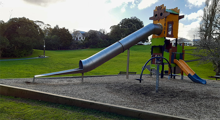 Gribblehirst Park - Lower playground with slides, ladder and rocker. Path, seating, grass fields and flying fox nearby.