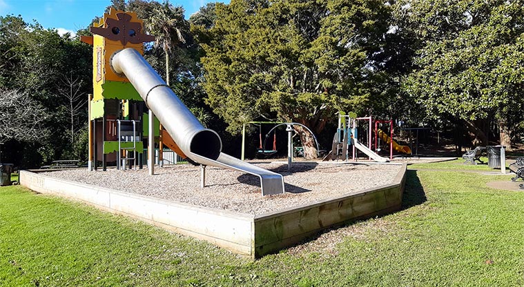 Gribblehirst Park – Lower playground with slide, climbing structure, rocker. Seating nearby.