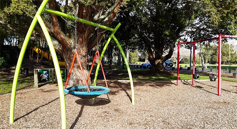Gribblehirst Park – Basket swing and set of two swings located in the lower playground.