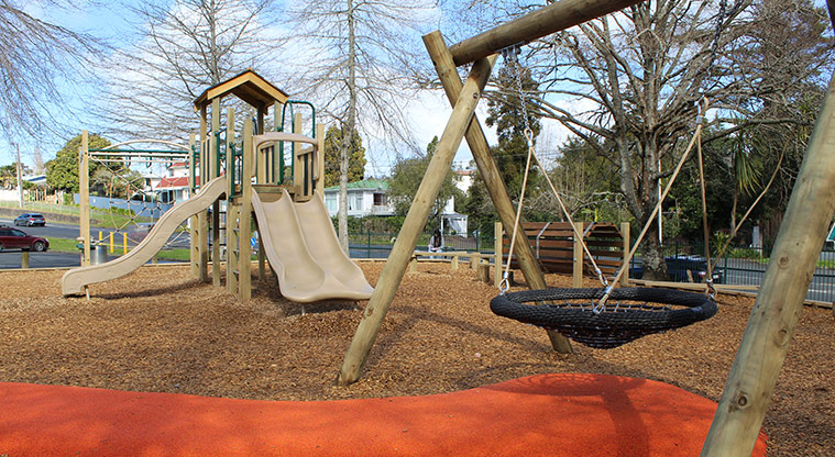 Harold Moody Reserve - Orange wet pour access to the basket swing, with the play module in the background.