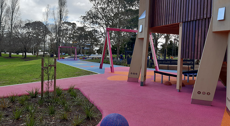 Manu-kau Noa Iho / Hayman Park - Bottom of the tower with coloured rubber matting leading to other sections of the playground.
