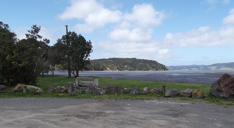 Huai Domain - Car park with Huia Bay in the background.