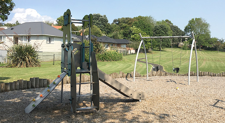 John Moore Reserve - Climbing frame with slide, and bucket swings. Photo credit: S Hulse.
