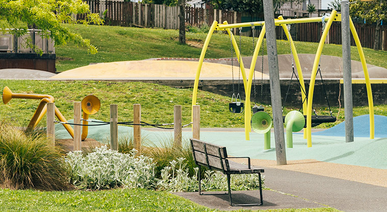 Marlborough Park - Talking tubes, swings and a seat in the junior play area. Photo credit: J Farnworth.